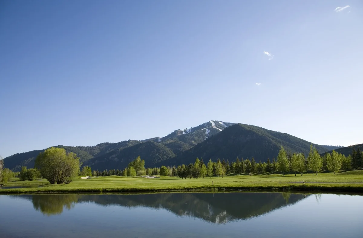 The fairway at Bigwood Golf with Bald Mountain in the background